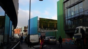 building with curtain walling, brise soleil and glazed aluminium extrusions in colour