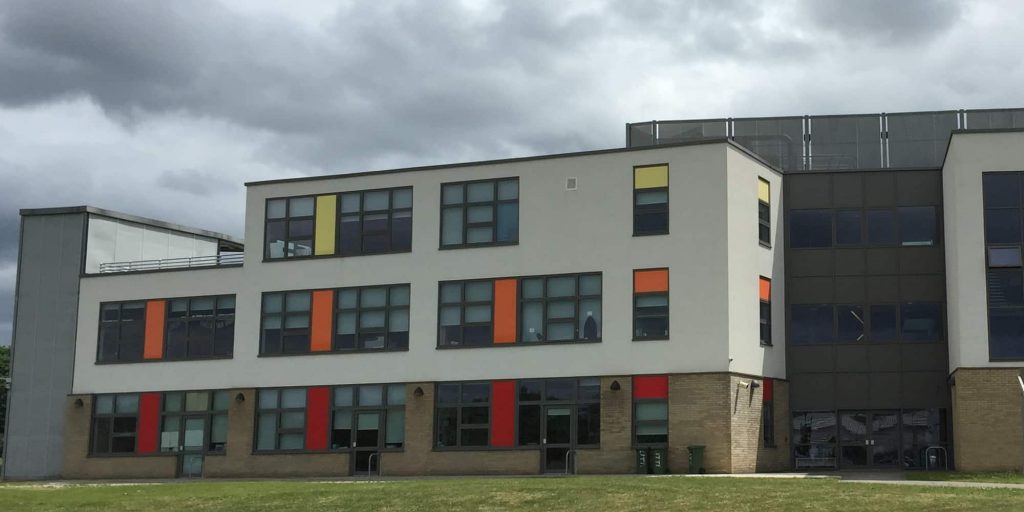 Syntha Pulvin Echelon powder coatings showing school with many coloured windows